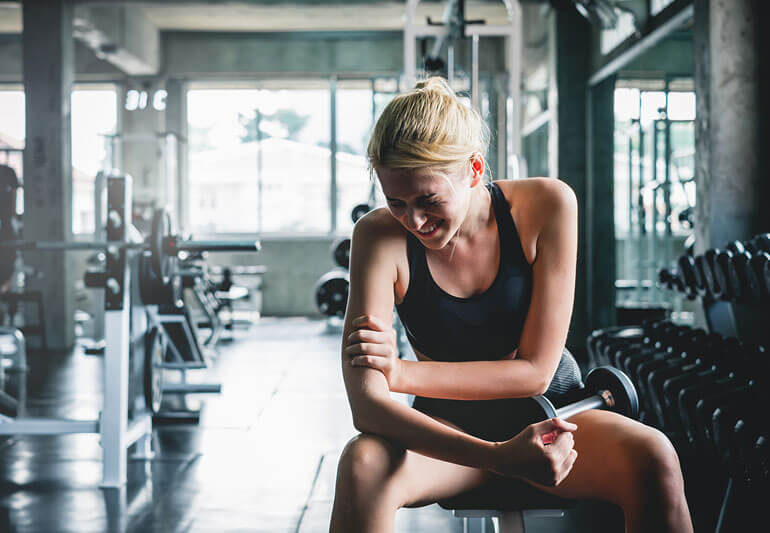 Tập gym đau cơ có nên tập tiếp và Cách khắc phục